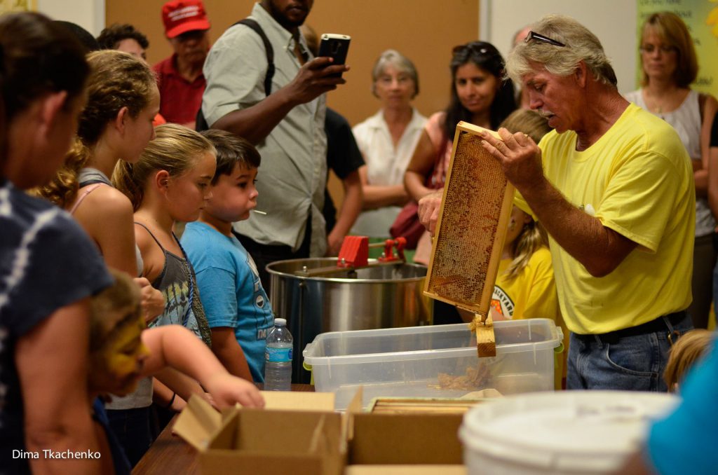 We demonstrate the importance of honeybees to children in the Brevard community.