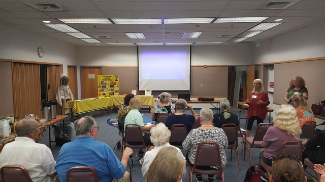 Melbourne Garden Club members listening carefully at the community presentation to Save the Bees.